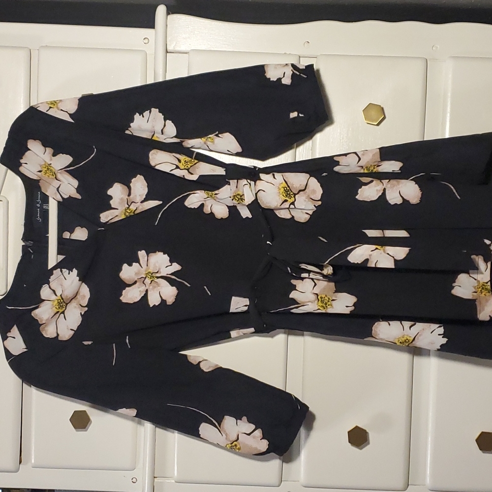 Floral romper. 3/4 sleeved. Size 2